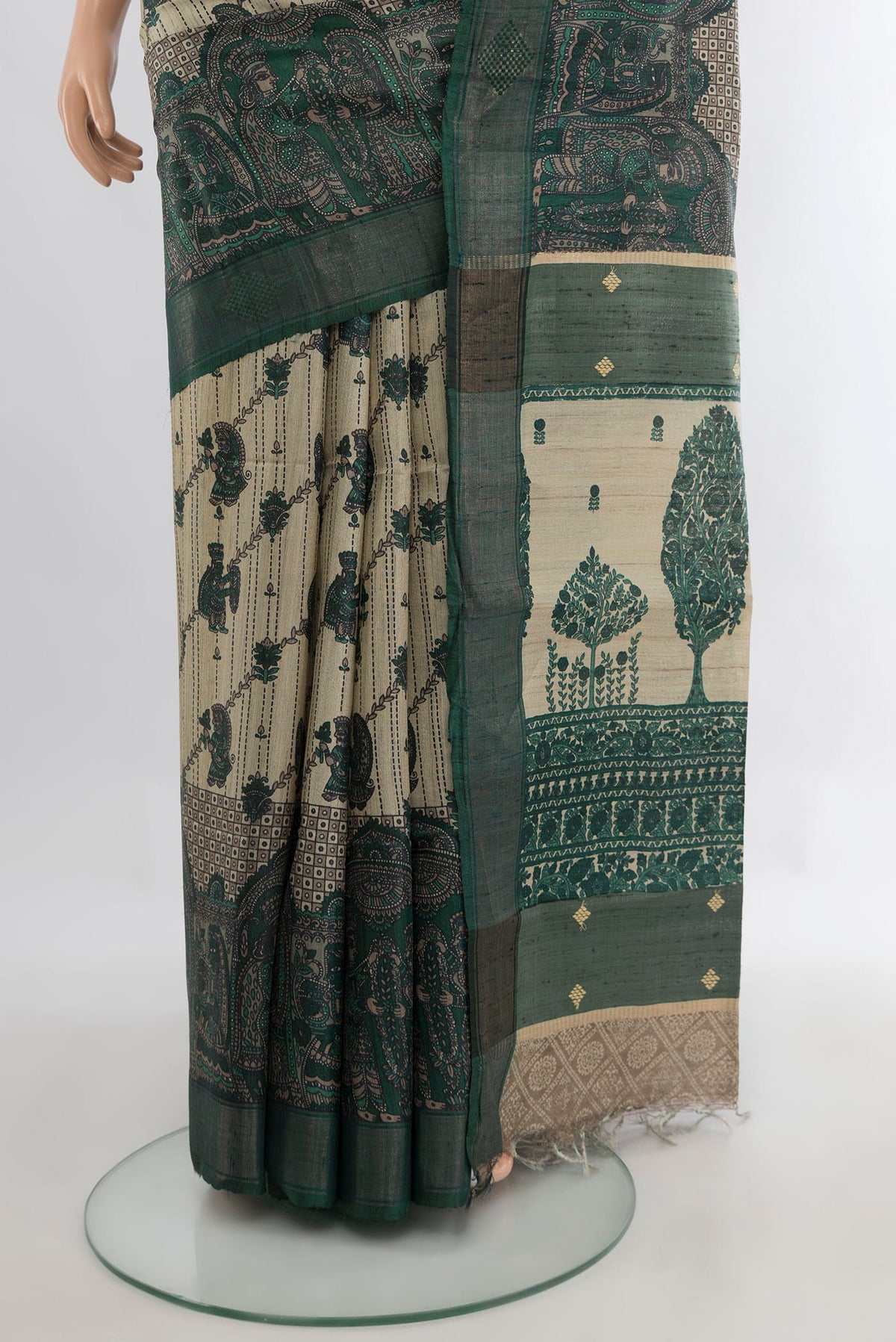 Pleats and pallu of Beige Tussar Saree with Floral Print on the body and Zari Border. 