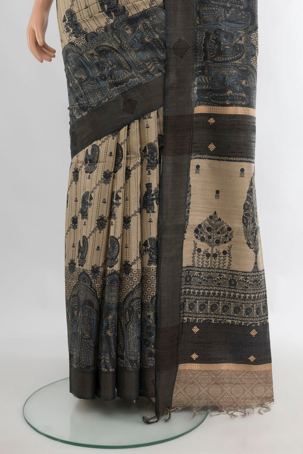 Pleats and pallu of Pure Silk Beige Tussar Saree with Embroidery on the body and Zari Border. 