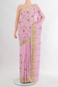 Rose pink Mysore Crepe Saree with Embroidery on the body and Zari Border.  displayed on a mannequin