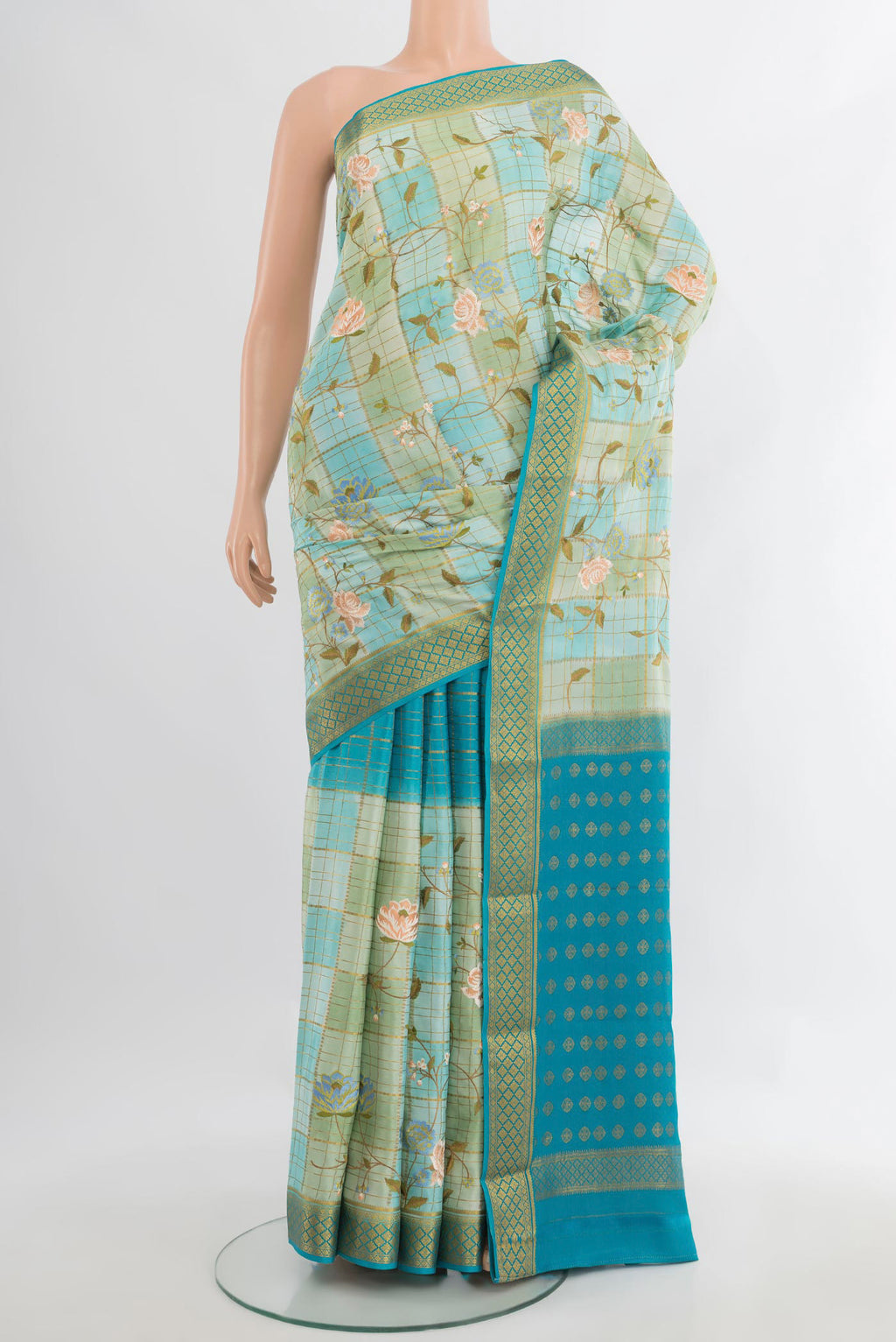 Multi Color Mysore Crepe Saree with Embroidery on the body and Zari Border.  displayed on a mannequin