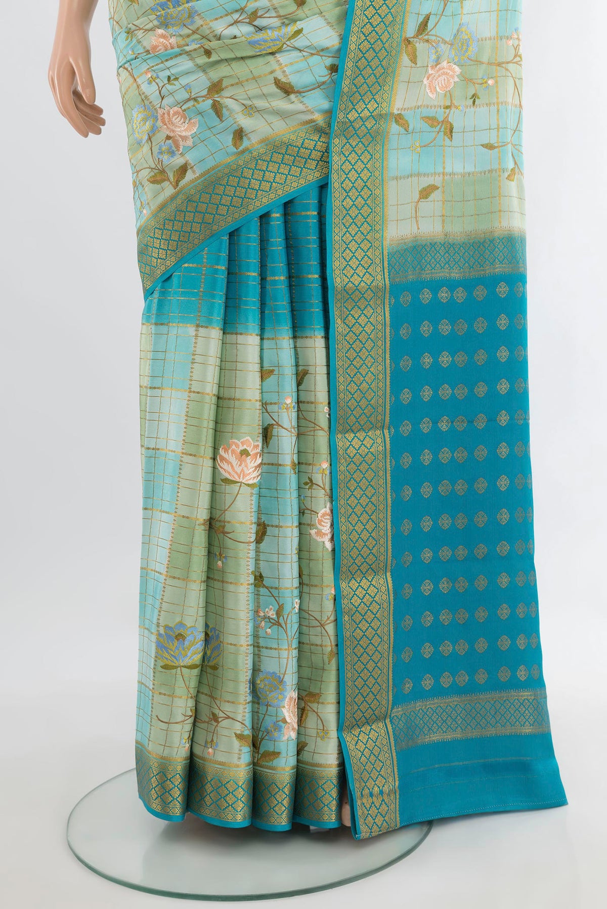 Pleats and pallu of Multi Color Mysore Crepe Saree with Embroidery on the body and Zari Border. 