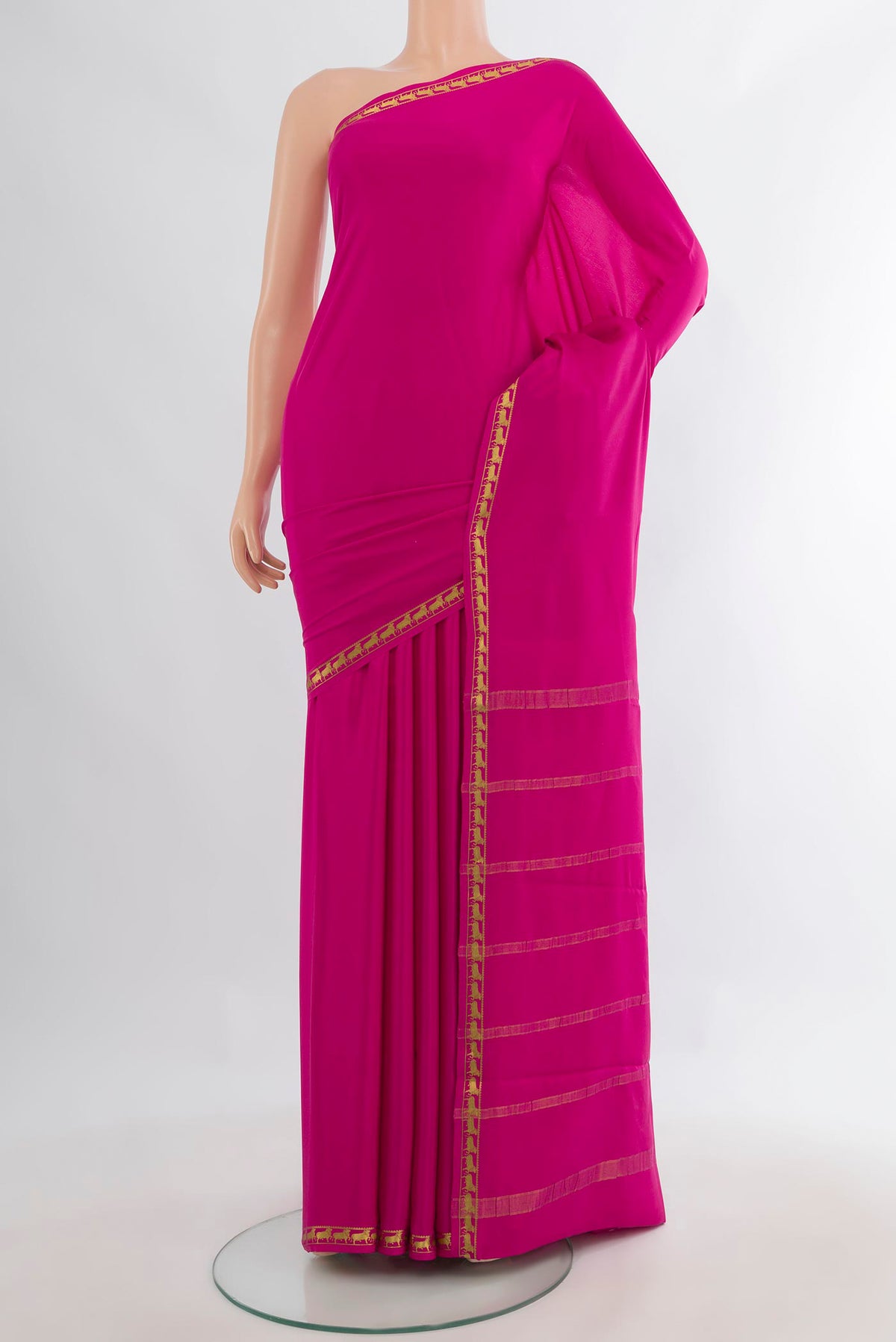 Pink Mysore Crepe Saree with Plain Body and Zari Border.  displayed on a mannequin