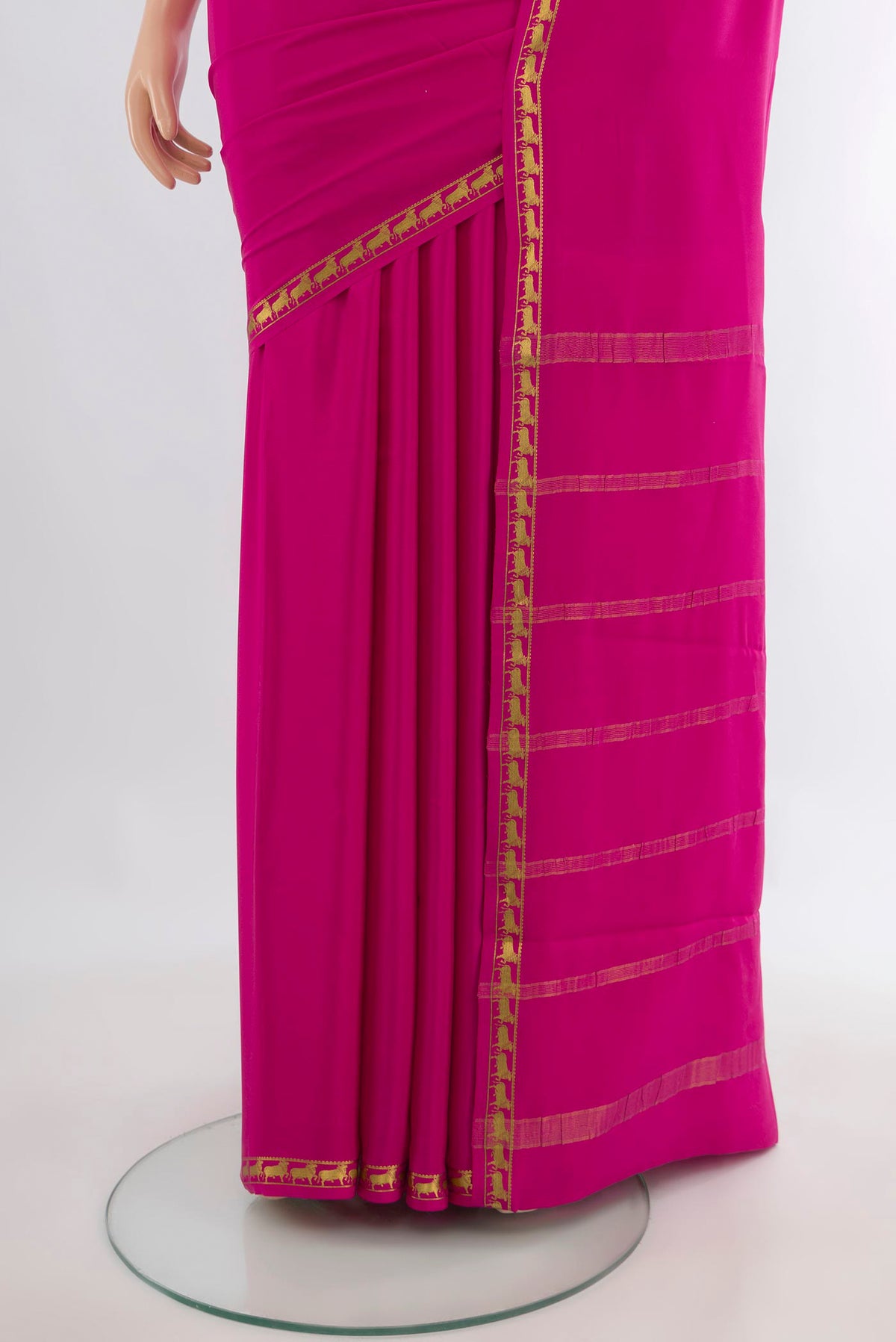 Pleats and pallu of Pink Mysore Crepe Saree with Plain Body and Zari Border. 