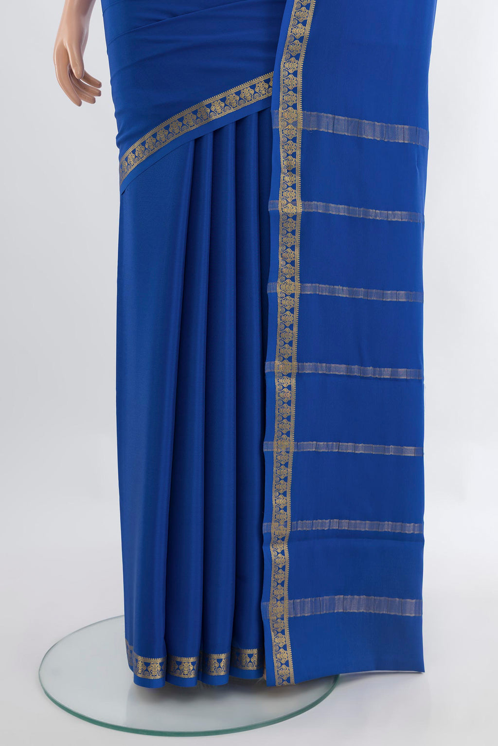 Pleats and pallu of Dark Blue Mysore Crepe Saree with Plain Body and Silk Border. 
