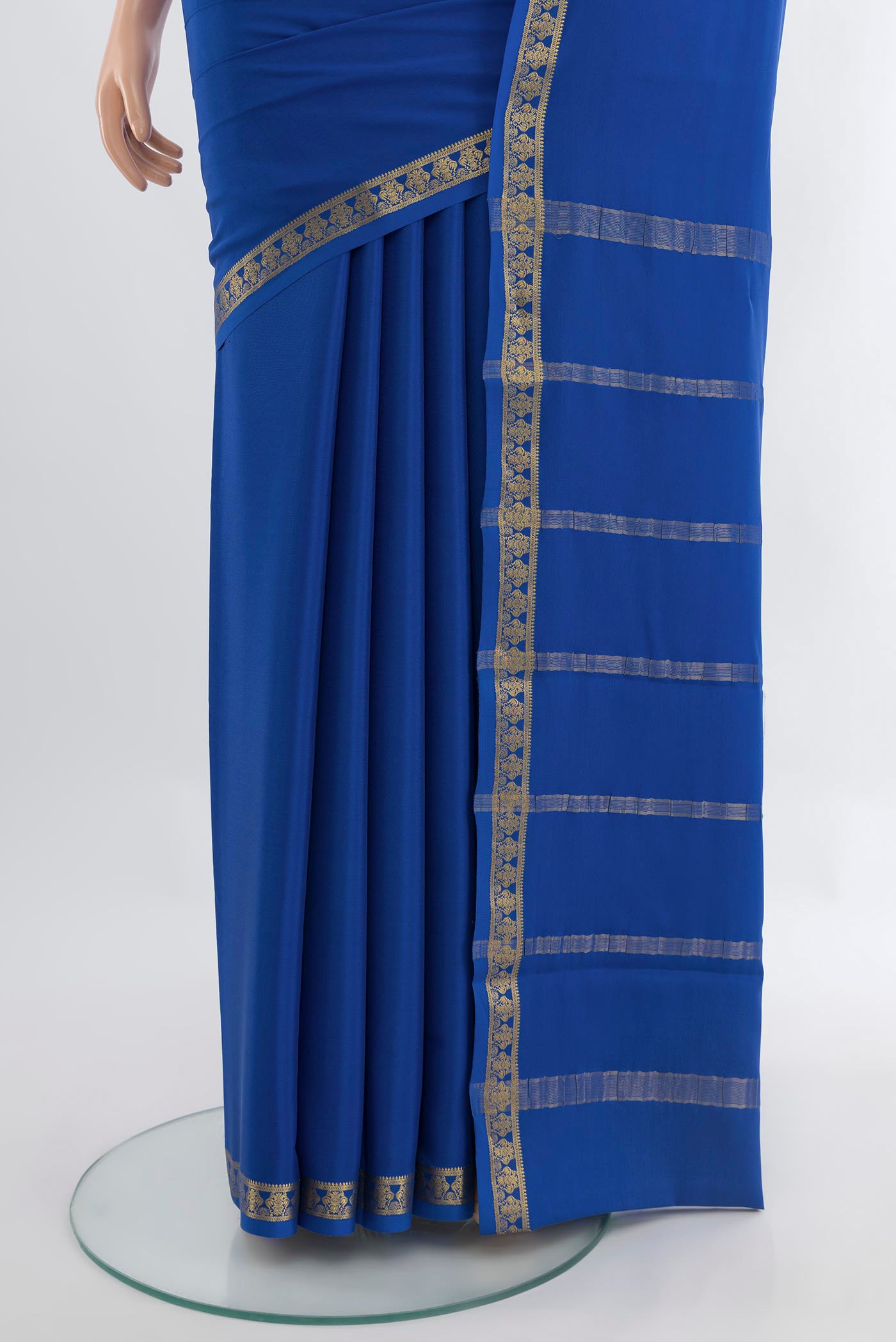 Pleats and pallu of Dark Blue Mysore Crepe Saree with Plain Body and Silk Border. 