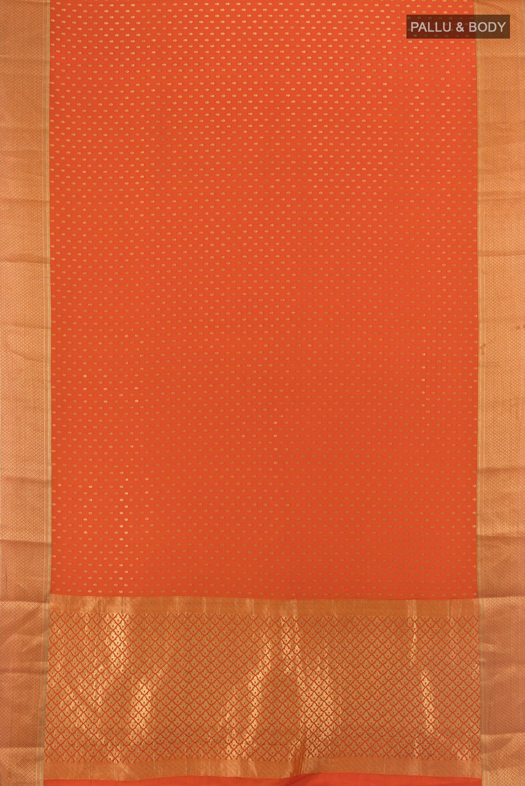 Flat view of Brick Orange Mysore Crepe Saree with Zari Butta on the body and Zari Border. 