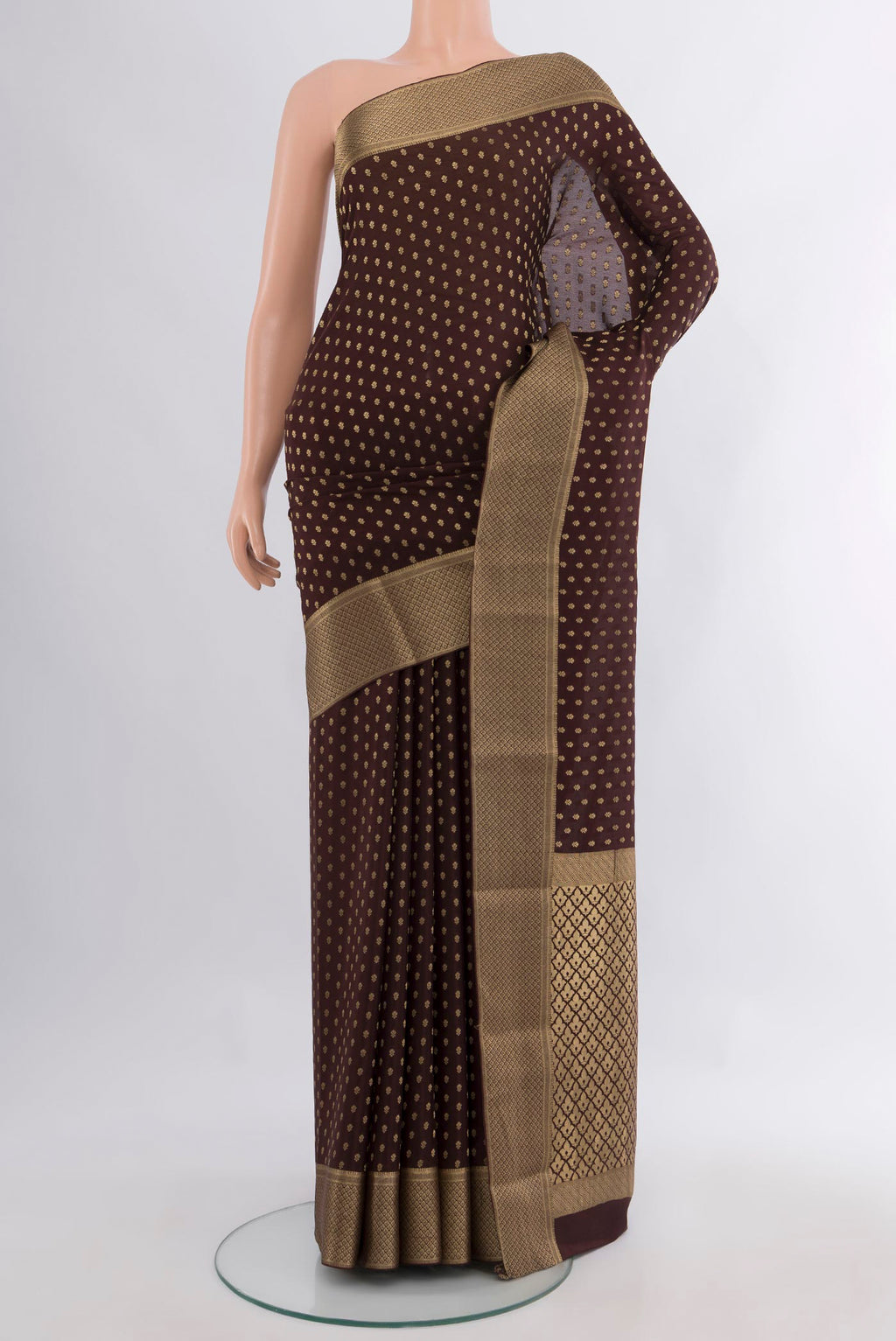 Coffee Brown Mysore Crepe Saree with Zari Butta on the body and Zari Border.  displayed on a mannequin
