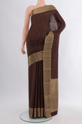 Coffee Brown Mysore Crepe Saree with Zari Butta on the body and Zari Border.  displayed on a mannequin