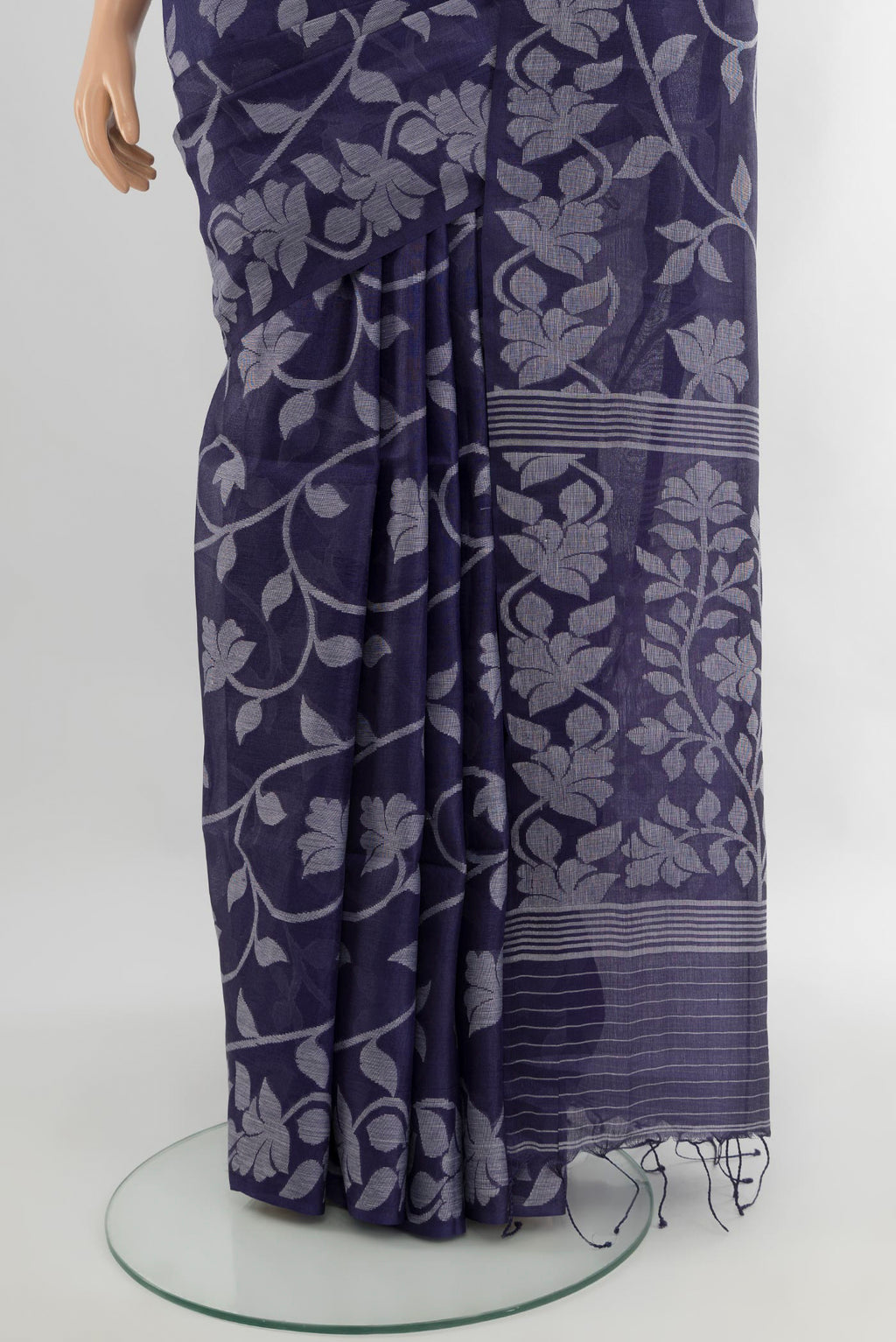 Pleats and pallu of Violet Bengal Cotton - Tangail Saree with Floral Print on the body and Thread Border. 