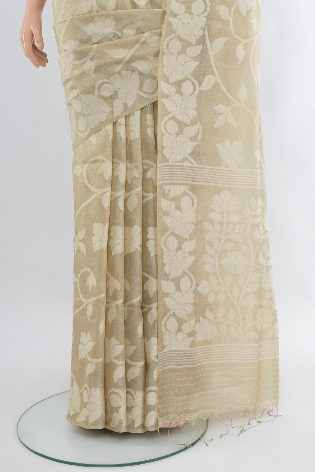 Pleats and pallu of Beige Bengal Cotton - Tangail Saree with Floral Print on the body and Thread Border. 