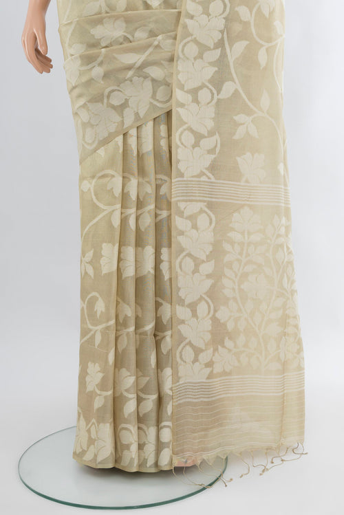 Pleats and pallu of Beige Bengal Cotton - Tangail Saree with Floral Print on the body and Thread Border. 