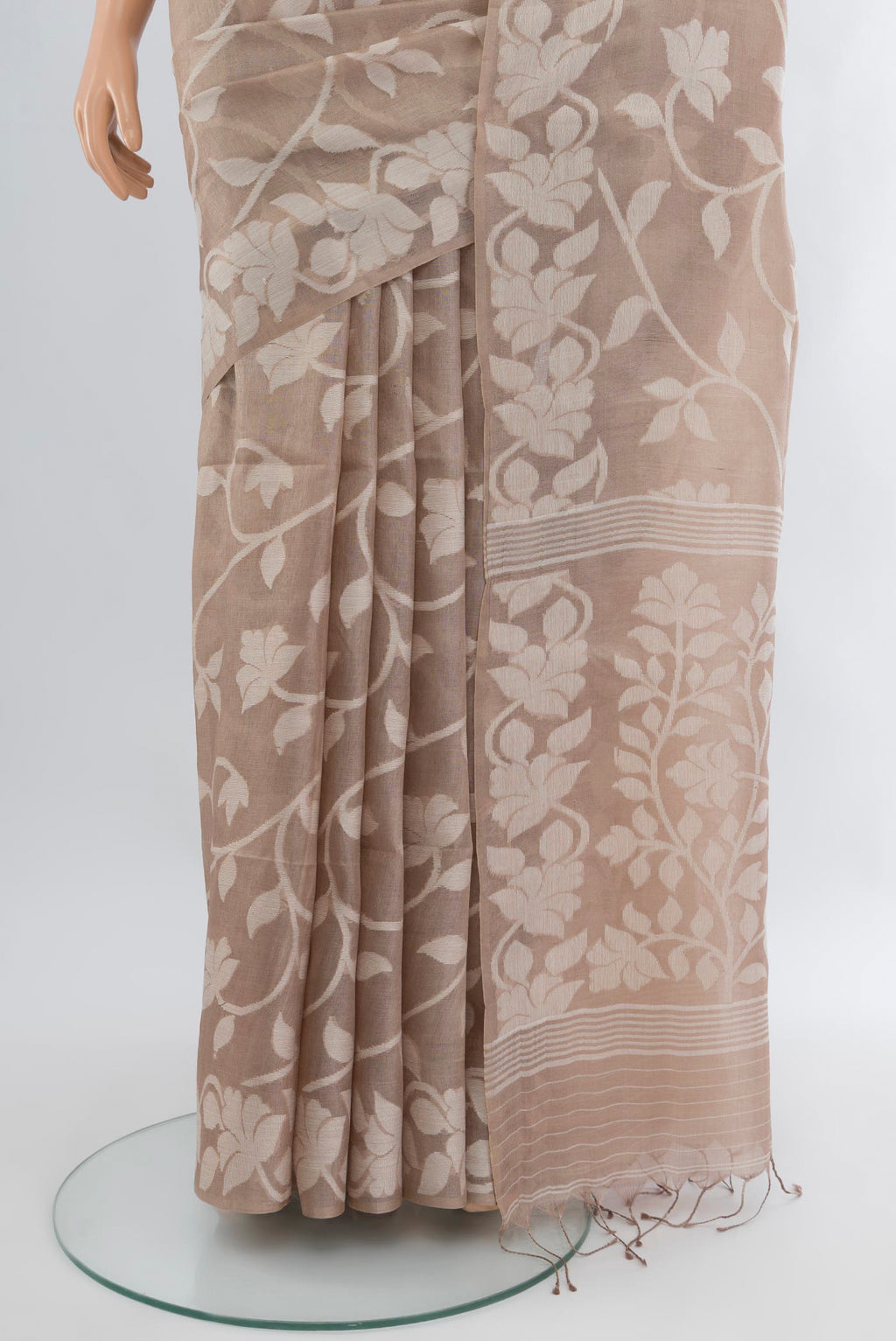 Pleats and pallu of Beige Bengal Cotton - Tangail Saree with Floral Print on the body and Thread Border. 