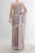 Grey Tussar Saree with Thread Butta on the body and Thread Border.  displayed on a mannequin