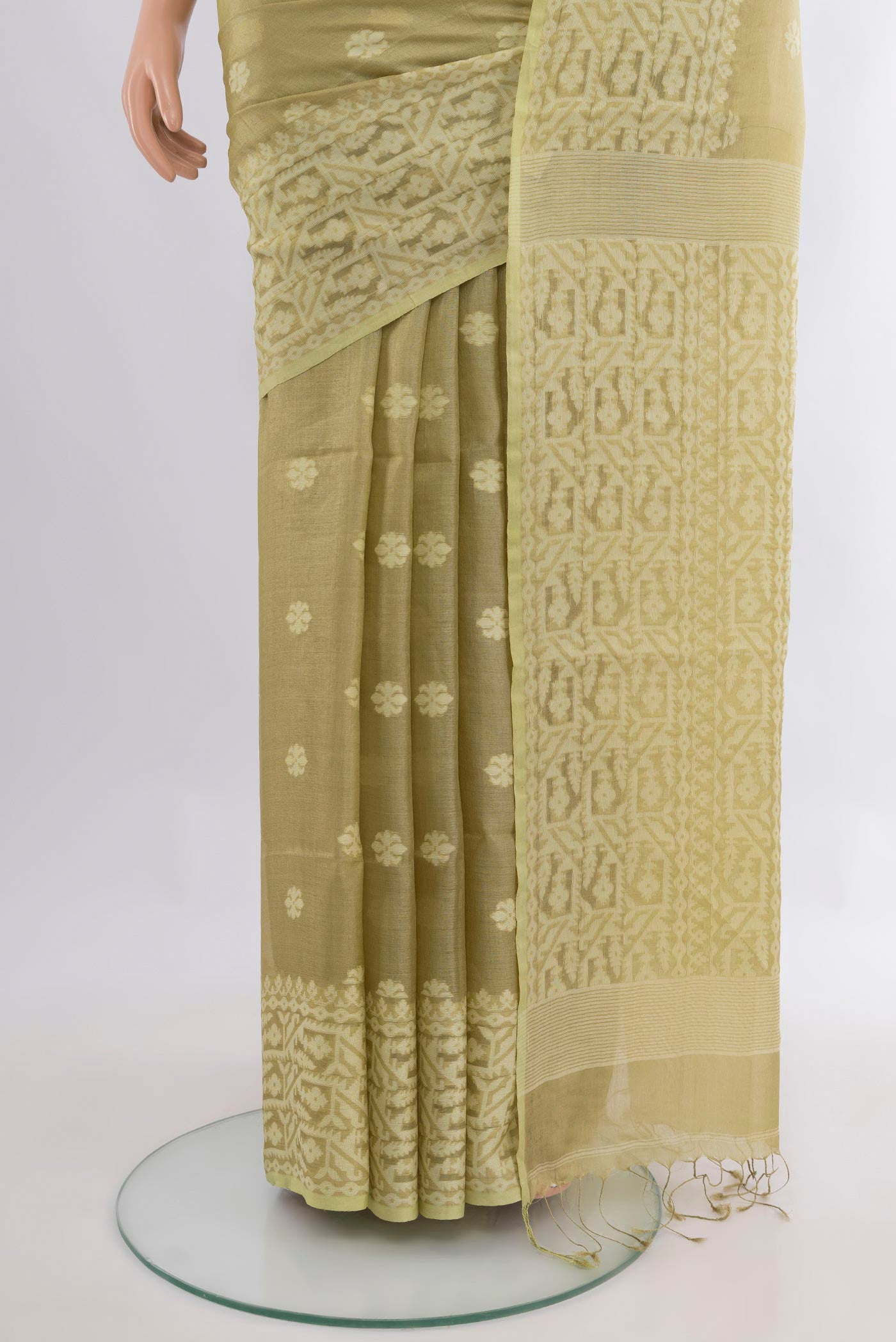 Pleats and pallu of Lemon Yellow Tussar Saree with Thread Butta on the body and Thread Border. 