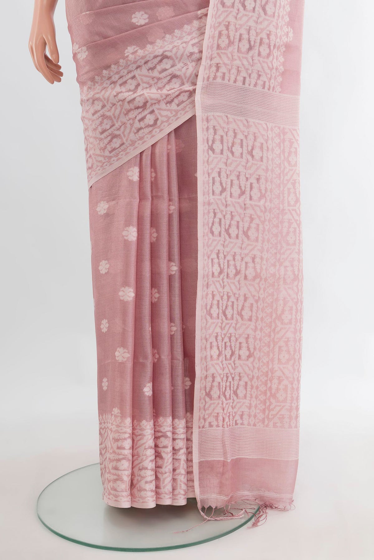 Pleats and pallu of Rose pink Tussar Saree with Thread Butta on the body and Thread Border. 