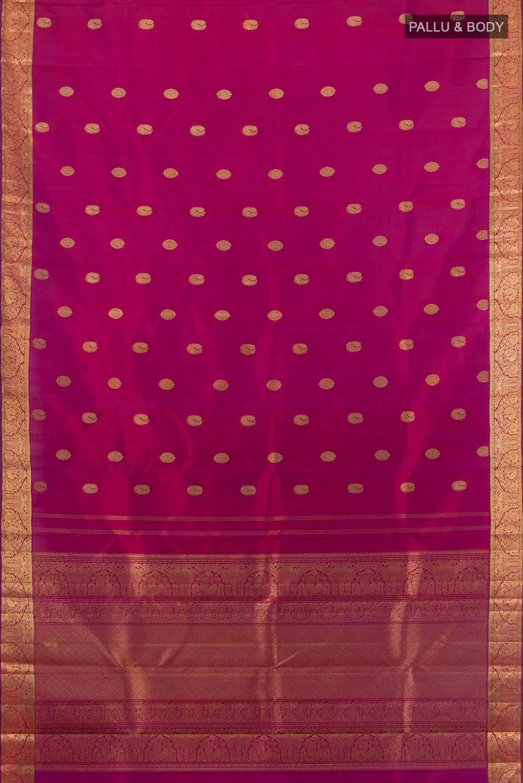 Flat view of Pure Silk Pure Zari Magenta Kanjivaram Saree with Zari Butta on the body and Zari Border. 