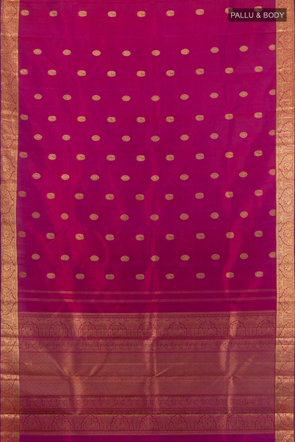 Flat view of Pure Silk Pure Zari Magenta Kanjivaram Saree with Zari Butta on the body and Zari Border. 