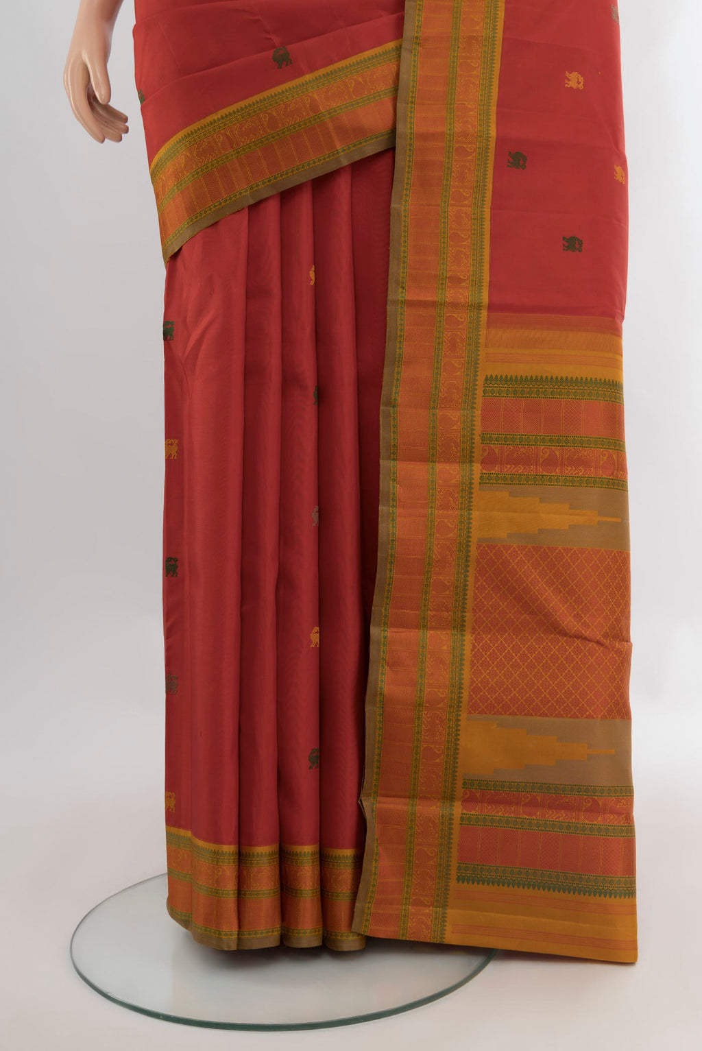 Pleats and pallu of Red Kanjivaram Silk Saree with Thread Butta on the body and Thread Border. 