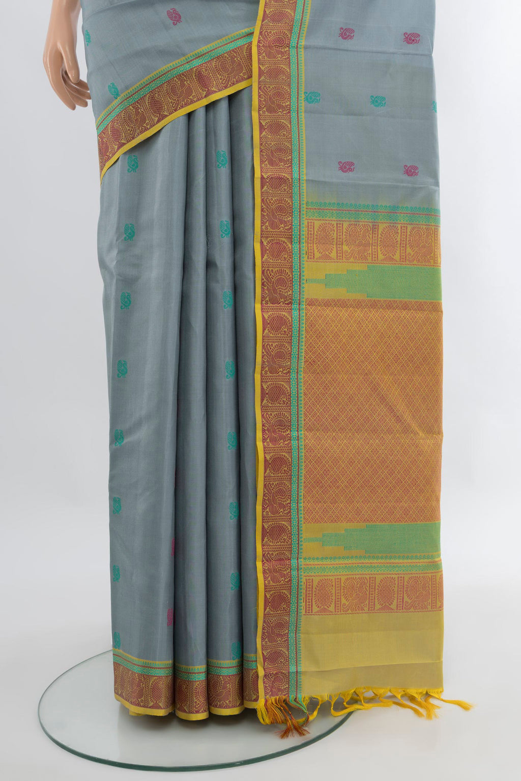 Pleats and pallu of Davys Grey Kanchipuram Silk Saree with Thread Butta on the body and Thread Border. 