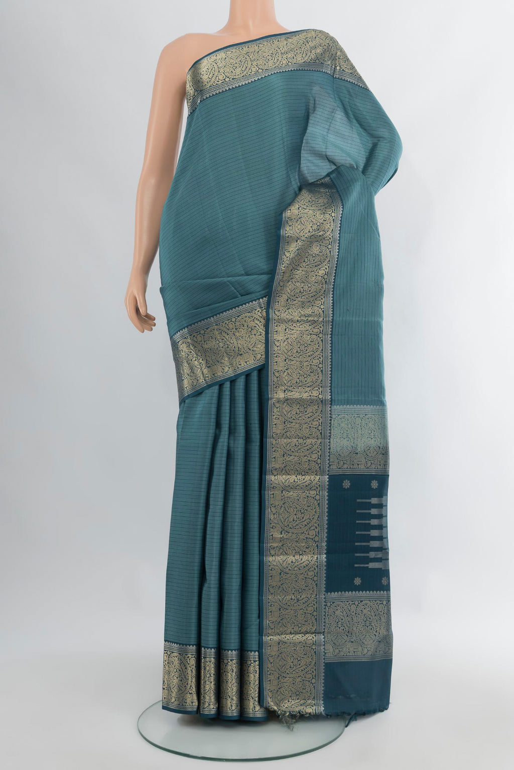 Blue Grey Kanchipuram Silk Saree with Stripes on the body and Zari Border.  displayed on a mannequin
