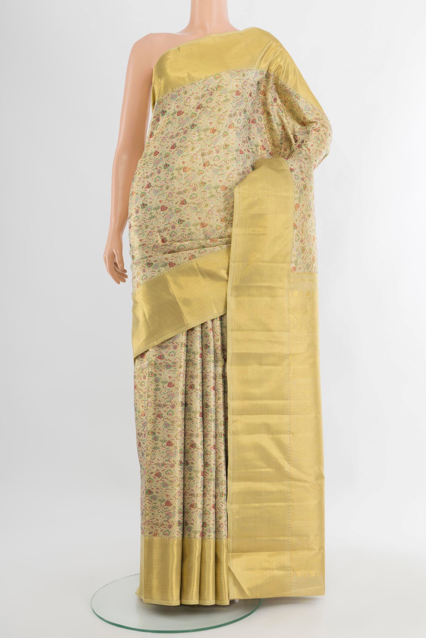 Pure Silk Pure Zari Golden Kanjivaram Tissue Saree with Zari Brocade on the body and Zari Border.  displayed on a mannequin