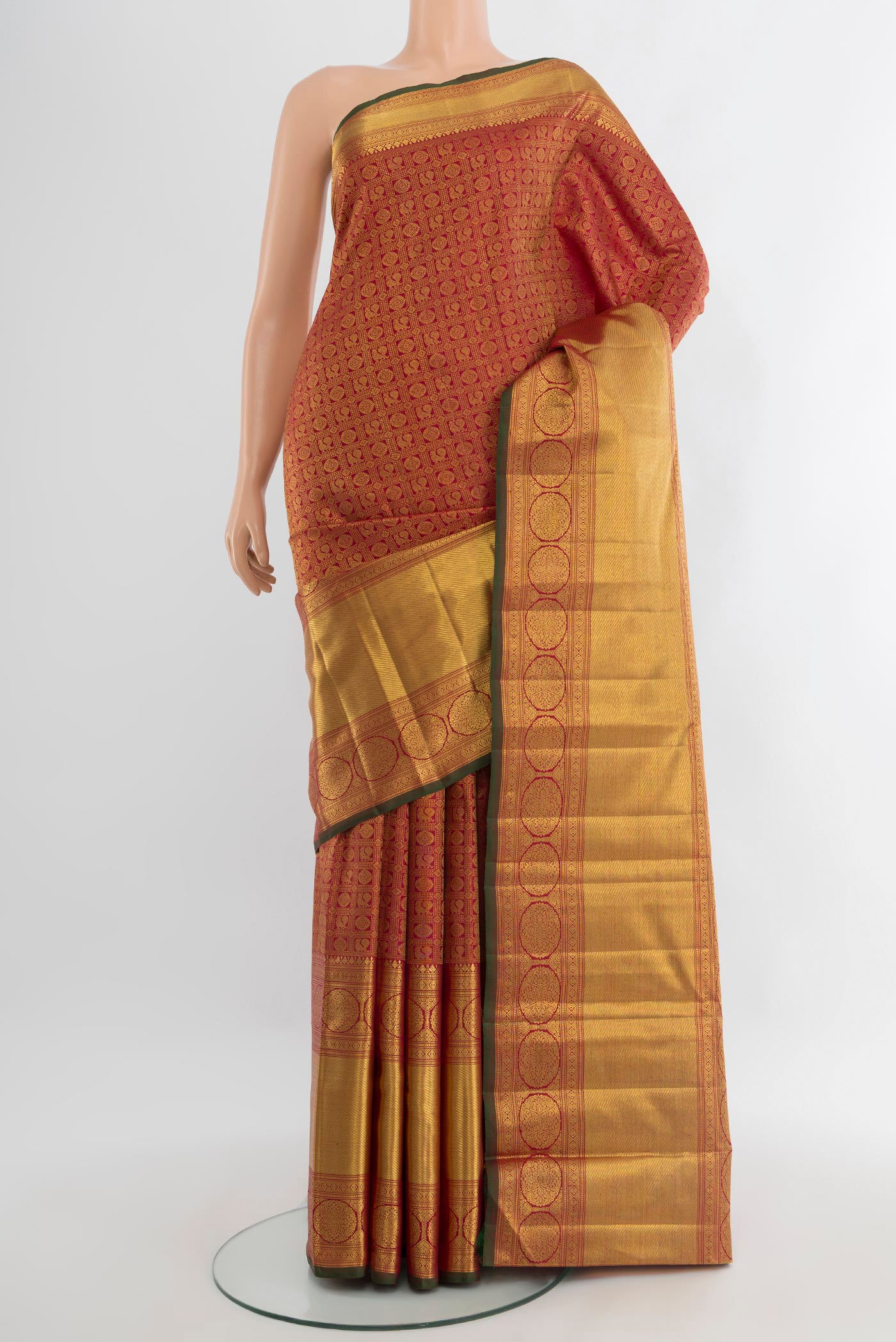 Pure Silk Pure Zari Maroon Kanjivaram Saree with Zari Brocade on the body and Zari Border.  displayed on a mannequin