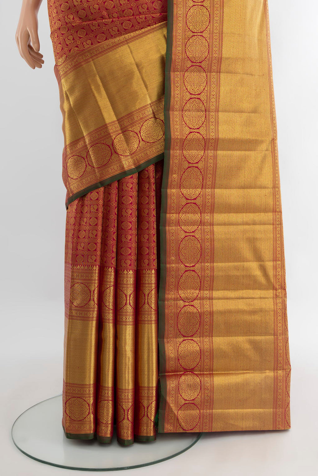 Pleats and pallu of Pure Silk Pure Zari Maroon Kanjivaram Saree with Zari Brocade on the body and Zari Border. 