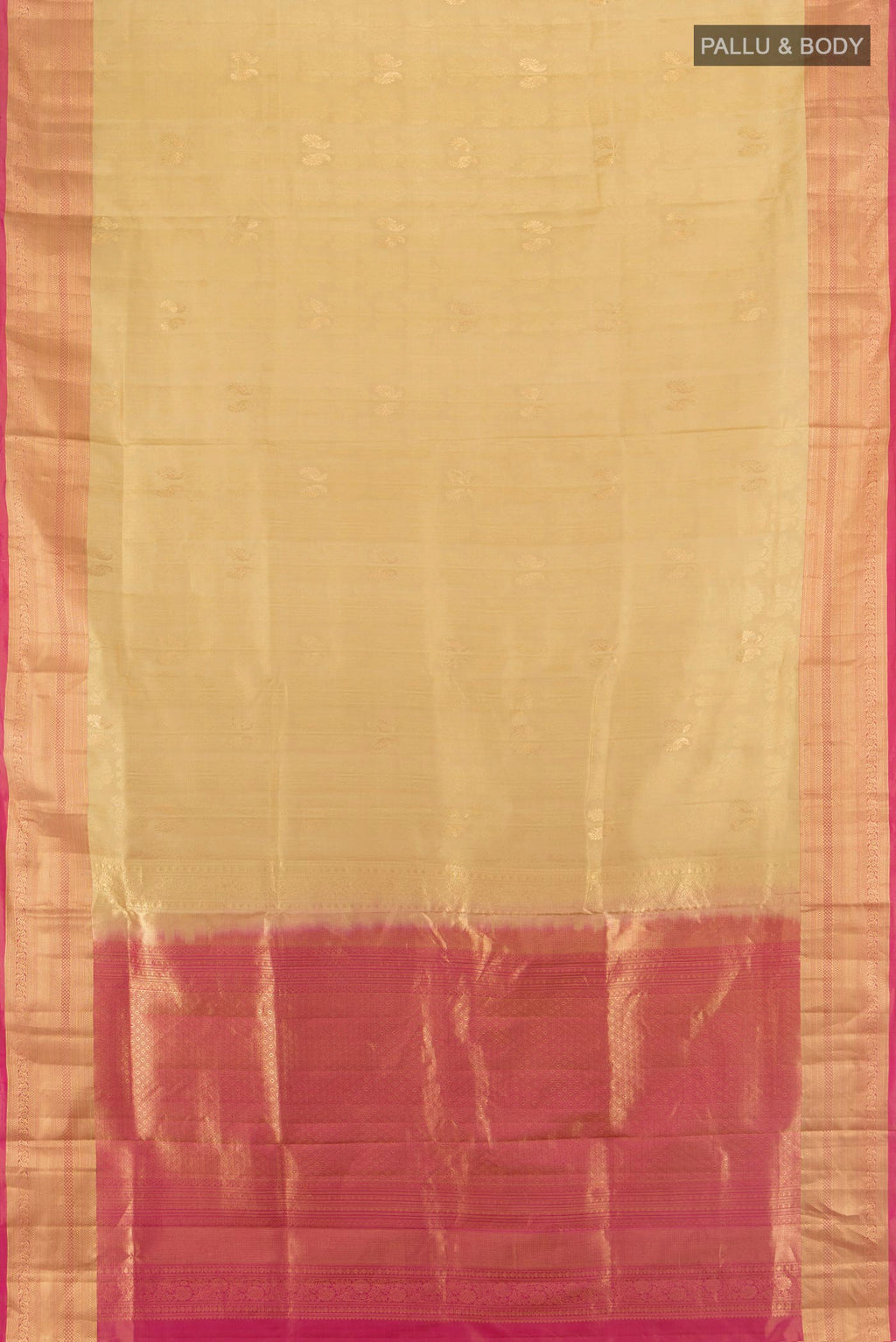 Flat view of Beige Soft Silk Saree with Zari Butta on the body and Zari Border. 