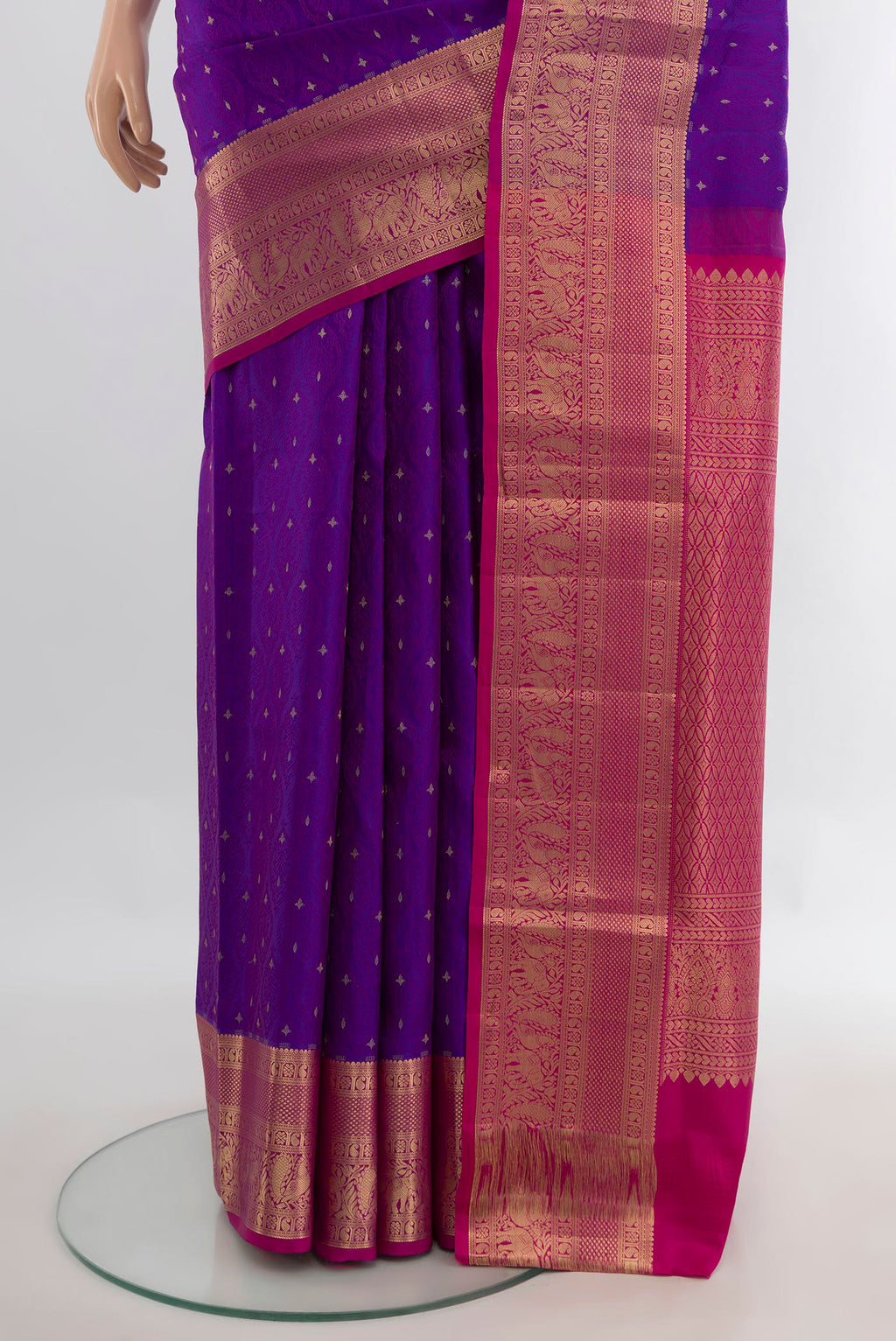 Pleats and pallu of Pure Silk Purple Soft Saree with Jacquard With Zari Butta on the body and Zari Border. 