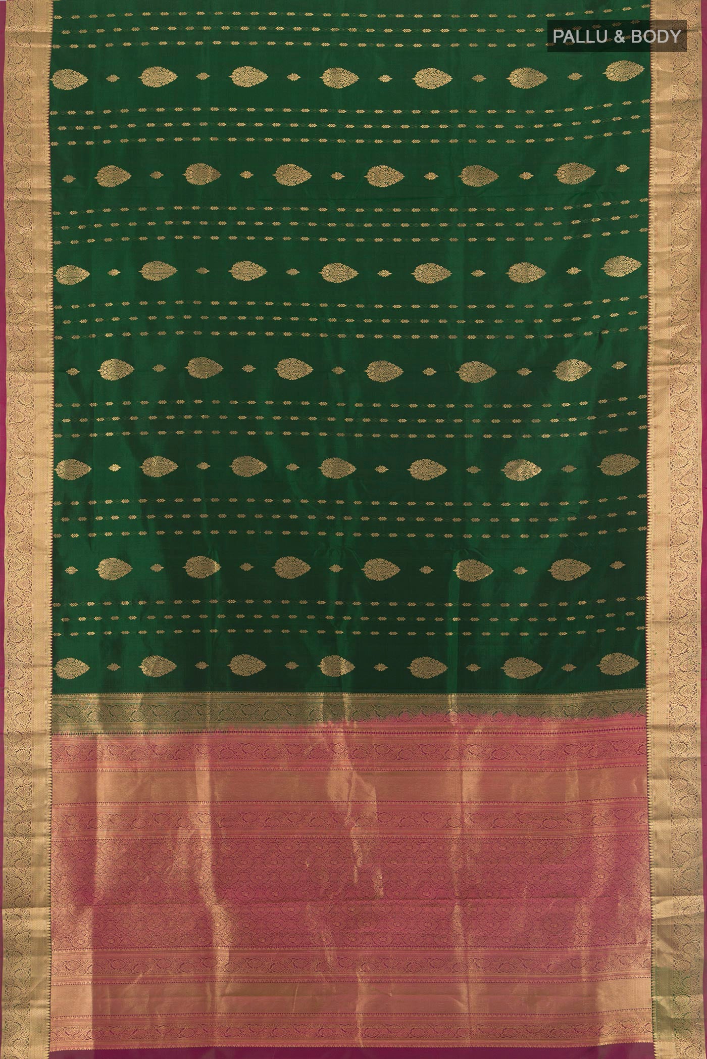 Flat view of Bottle Green Soft Silk Saree with Zari Butta on the body and Zari Border. 