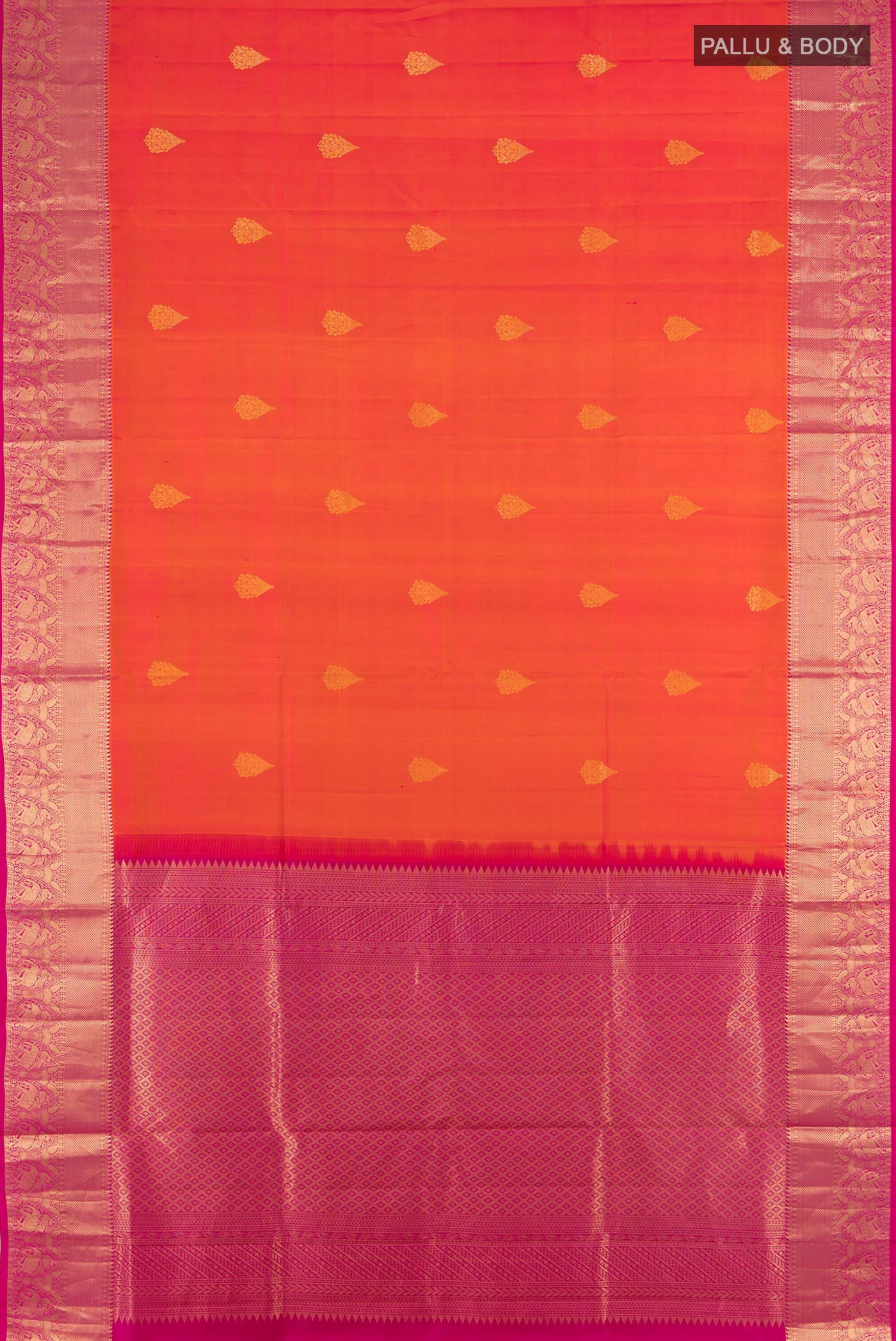 Flat view of Peach Soft Silk Saree with Zari Butta on the body and Silk Border. 
