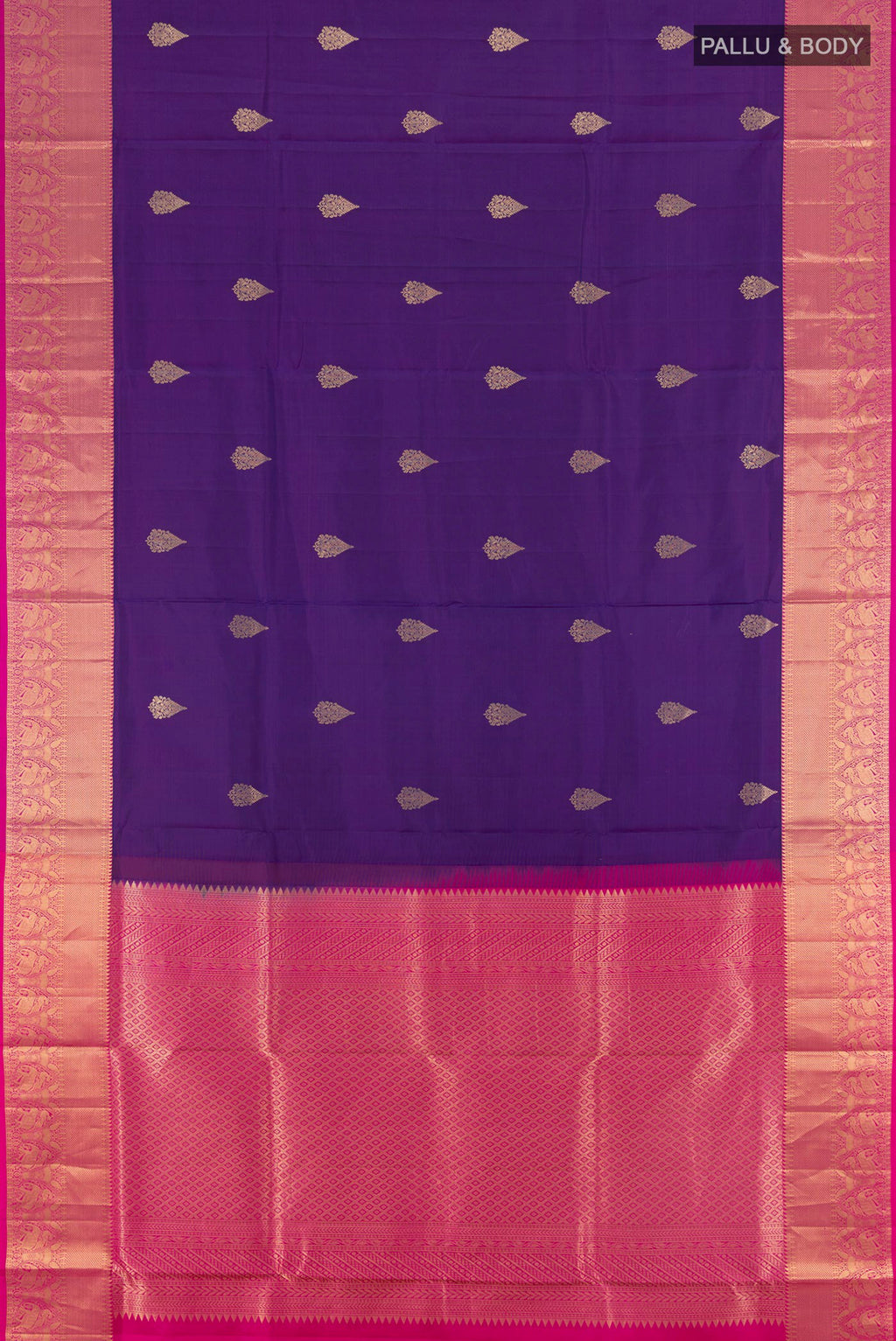 Flat view of Violet Soft Silk Saree with Zari Butta on the body and Zari Border. 