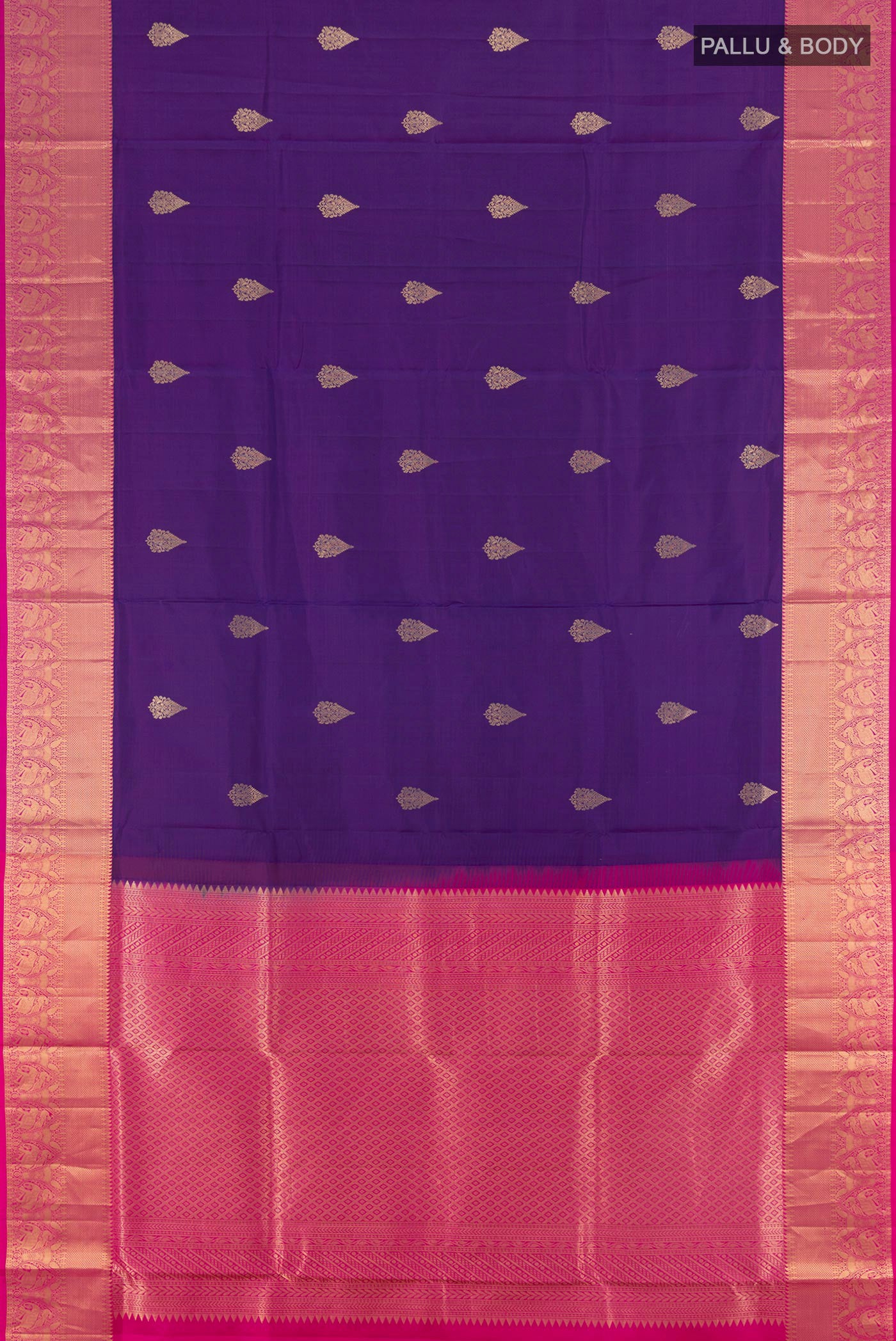 Flat view of Violet Soft Silk Saree with Zari Butta on the body and Zari Border. 