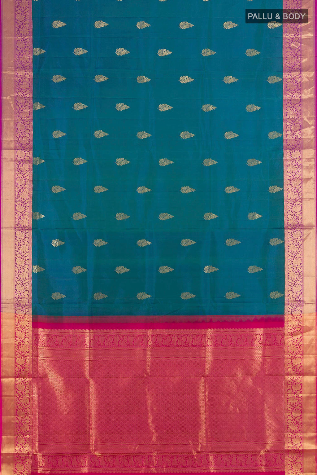 Flat view of Pure Silk Peacock Blue Soft Saree with Zari Butta on the body and Zari Border. 