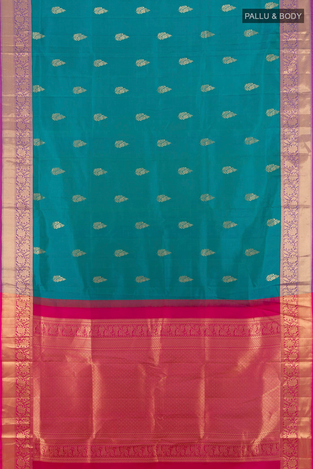 Flat view of Pure Silk Peacock Blue Soft Saree with Zari Butta on the body and Zari Border. 