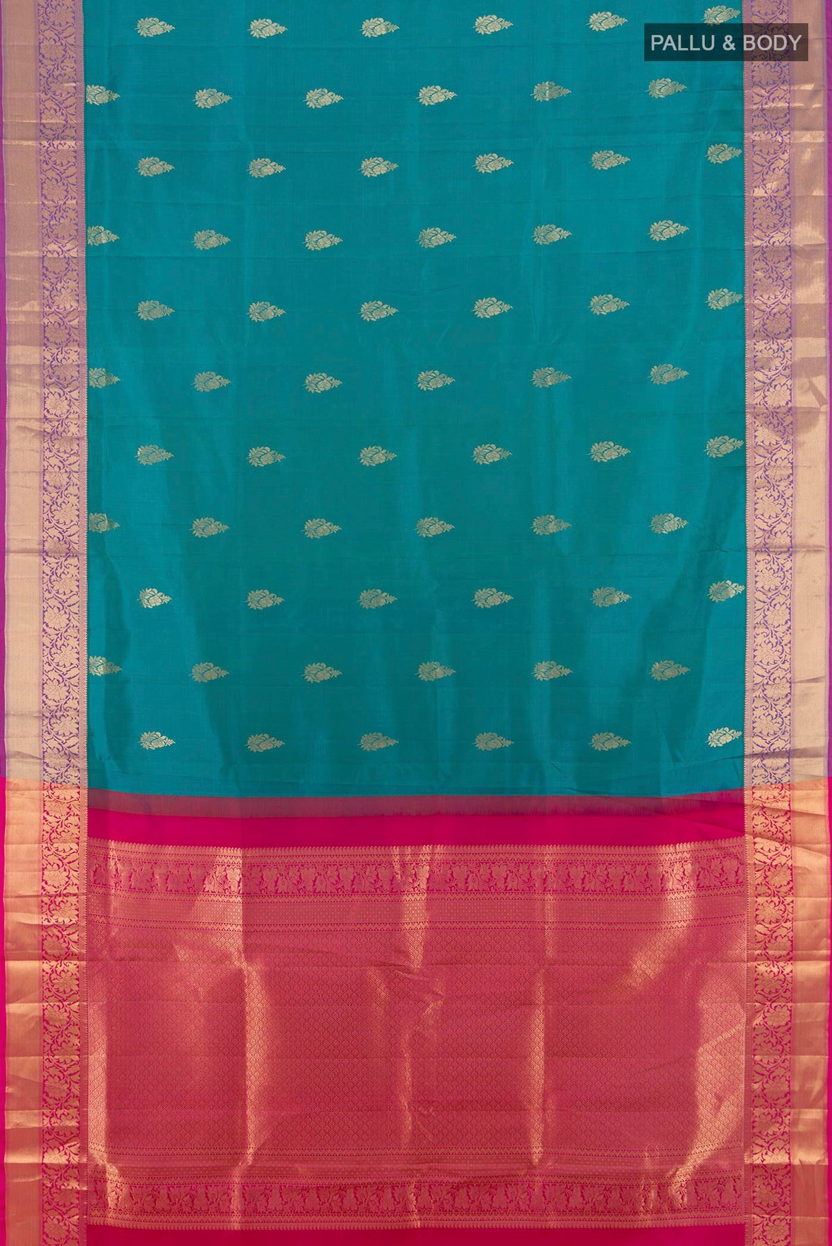 Flat view of Pure Silk Peacock Blue Soft Saree with Zari Butta on the body and Zari Border. 
