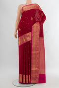 Maroon Soft Silk Saree with Zari Butta on the body and Zari Border.  displayed on a mannequin