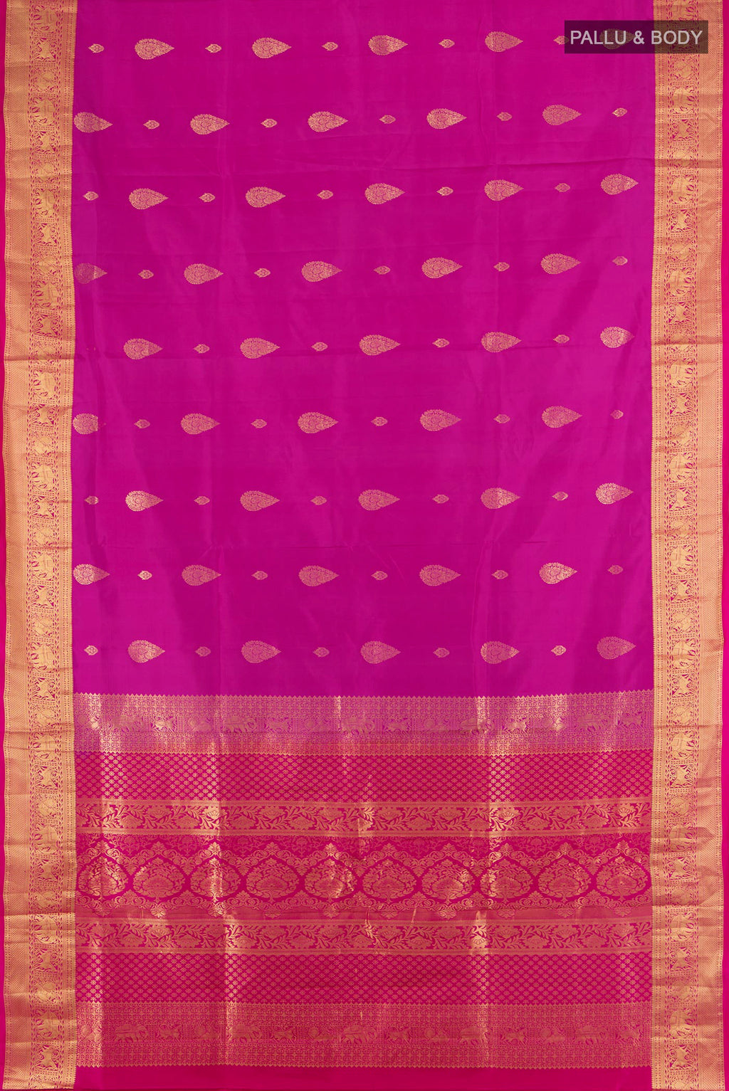 Flat view of Magenta Soft Silk Saree with Zari Butta on the body and Silk Border. 