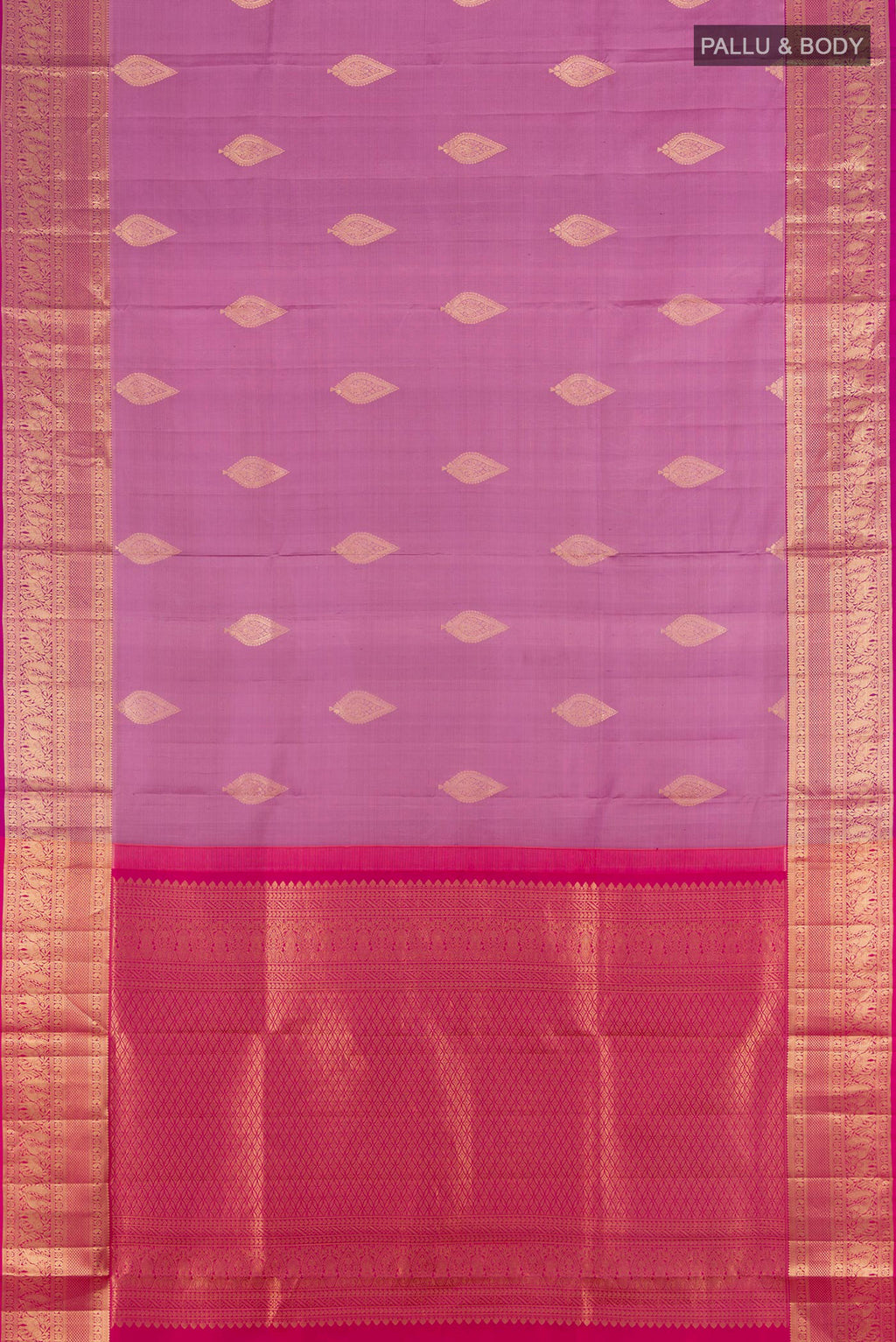 Flat view of Lavender Soft Silk Saree with Zari Butta on the body and Zari Border. 