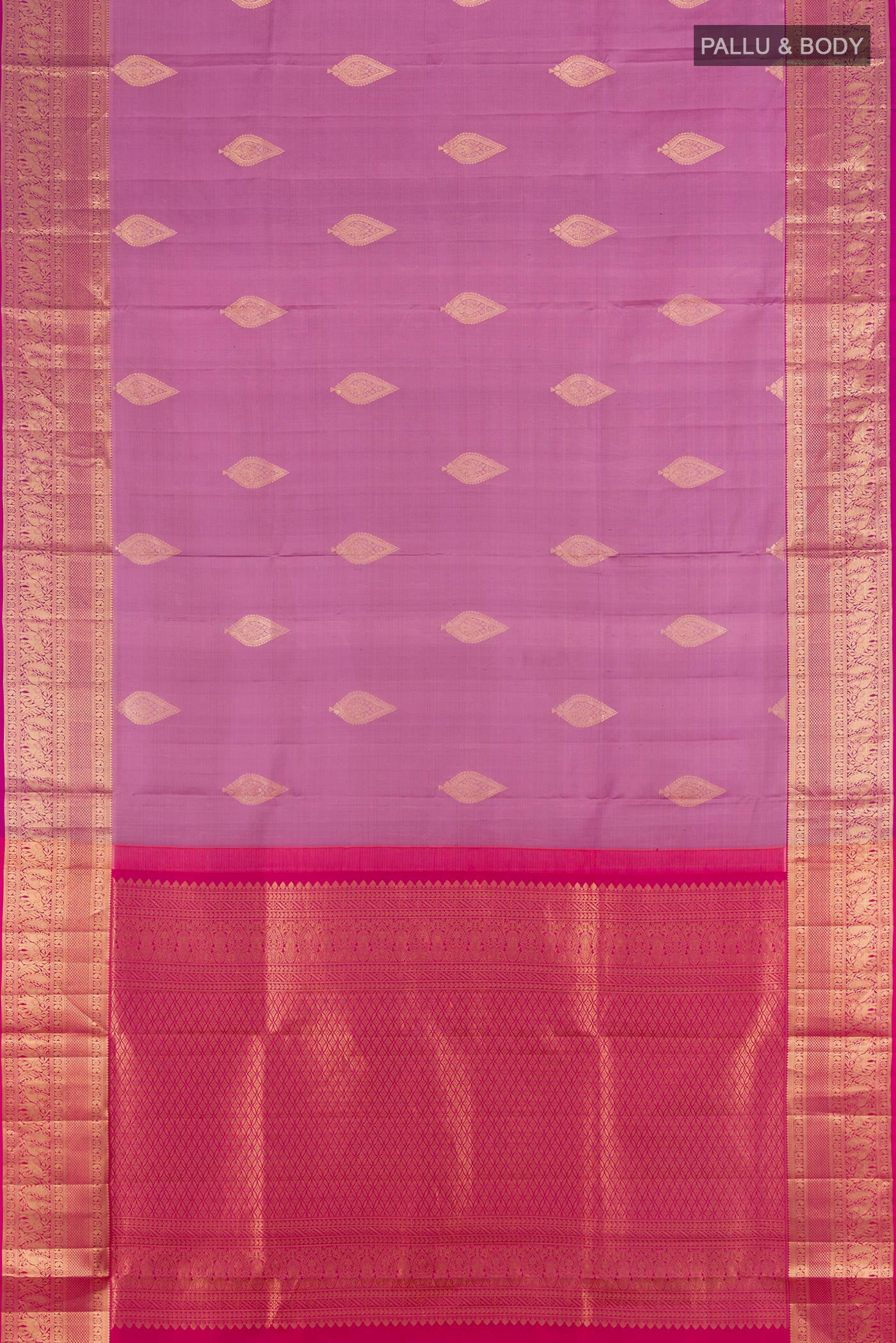 Flat view of Lavender Soft Silk Saree with Zari Butta on the body and Zari Border. 