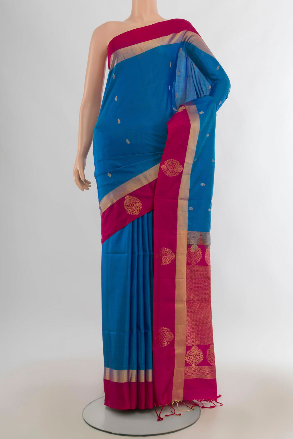 Pure Silk Light Blue Soft Saree with Zari Butta on the body and Zari Border.  displayed on a mannequin