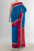Pure Silk Light Blue Soft Saree with Zari Butta on the body and Zari Border.  displayed on a mannequin