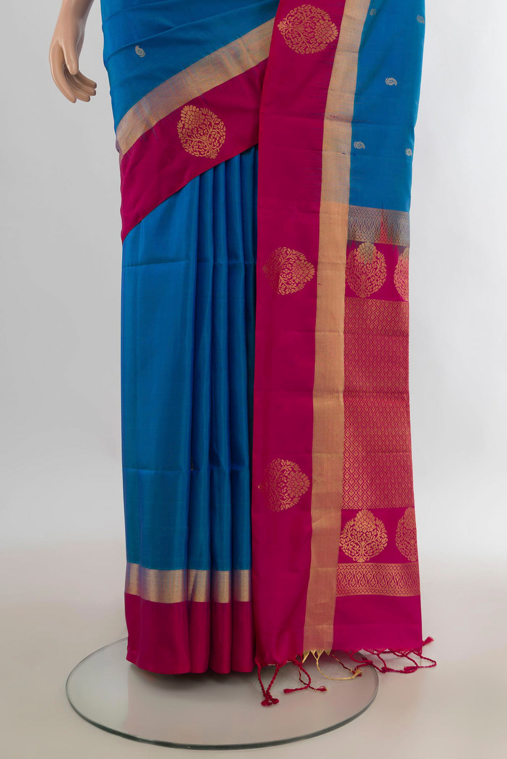 Pleats and pallu of Pure Silk Light Blue Soft Saree with Zari Butta on the body and Zari Border. 