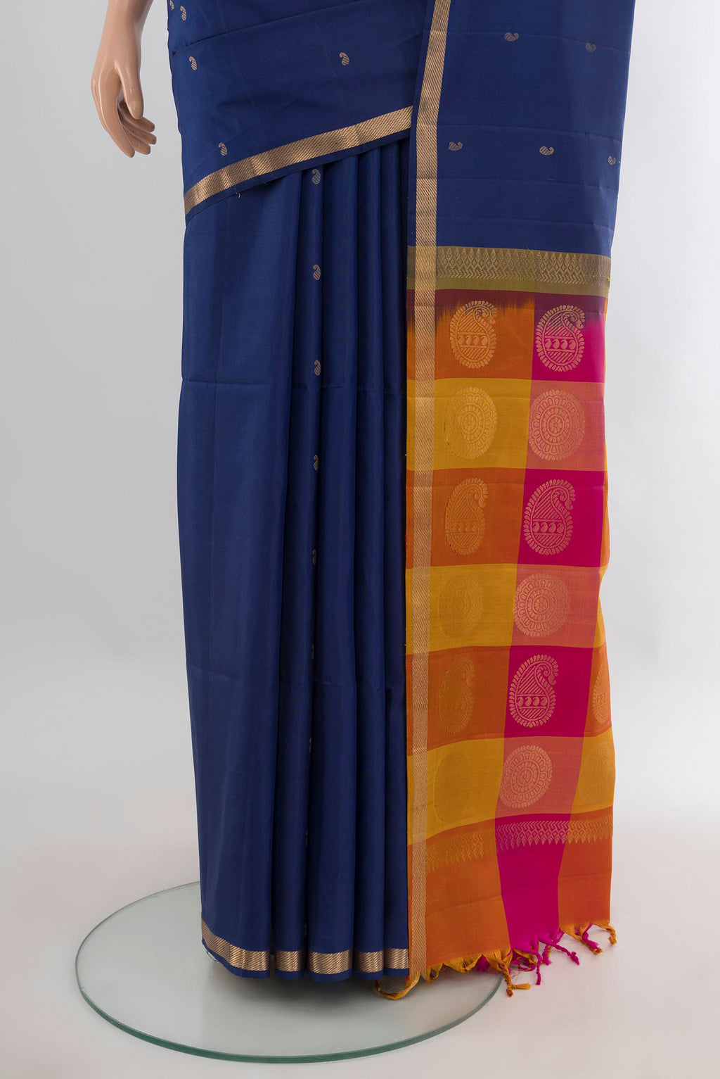Pleats and pallu of Pure Silk Navy Blue Soft Saree with Zari Butta on the body and Zari Border. 