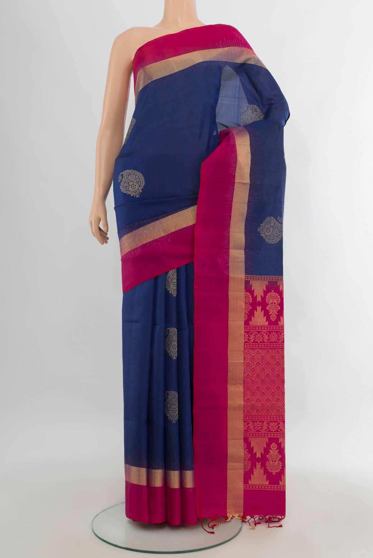 Pure Silk Blue Soft Saree with Zari Butta on the body and Plain Border.  displayed on a mannequin
