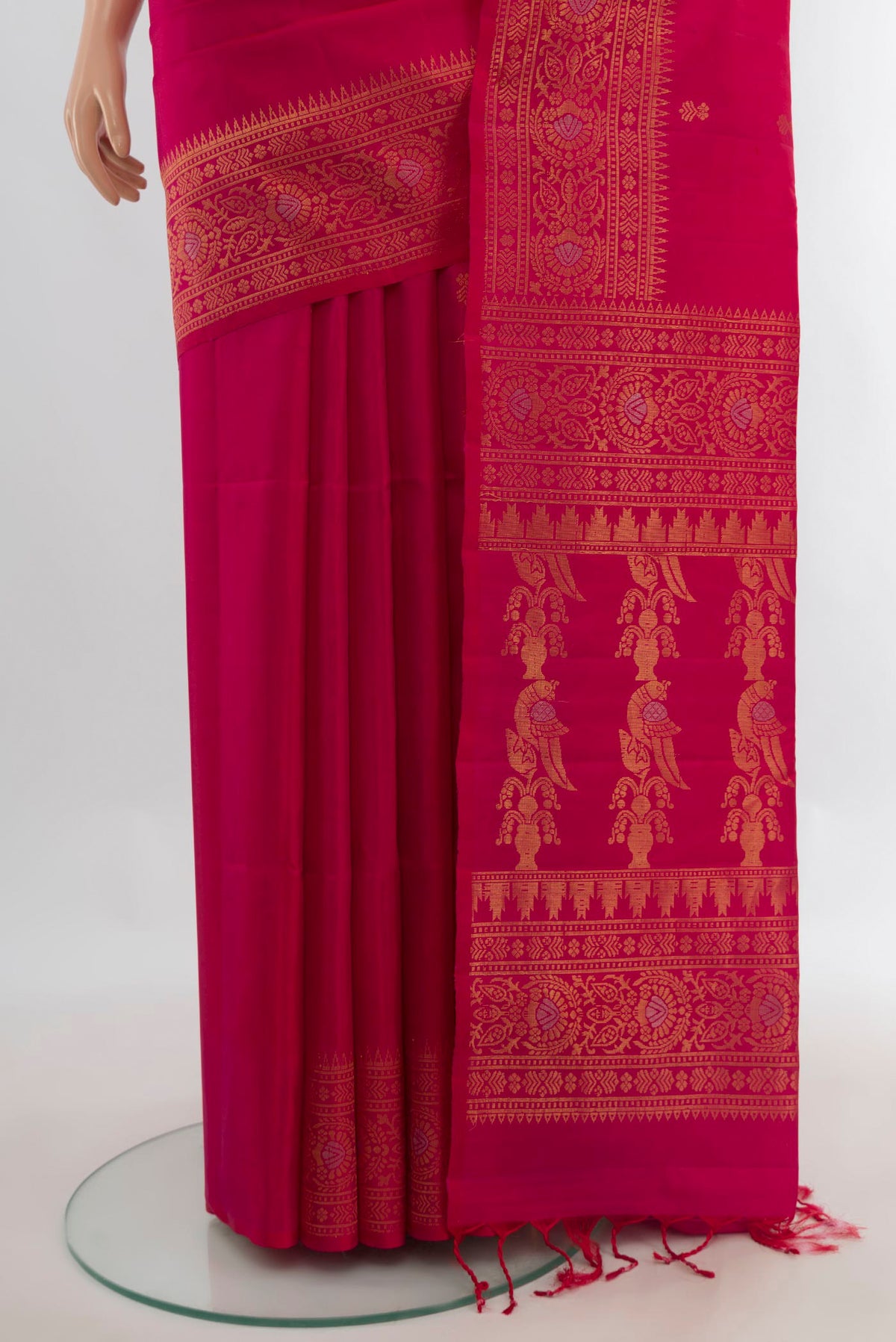Pleats and pallu of Pure Silk Dark Pink Soft Saree with Zari Butta on the body and Fancy Border. 