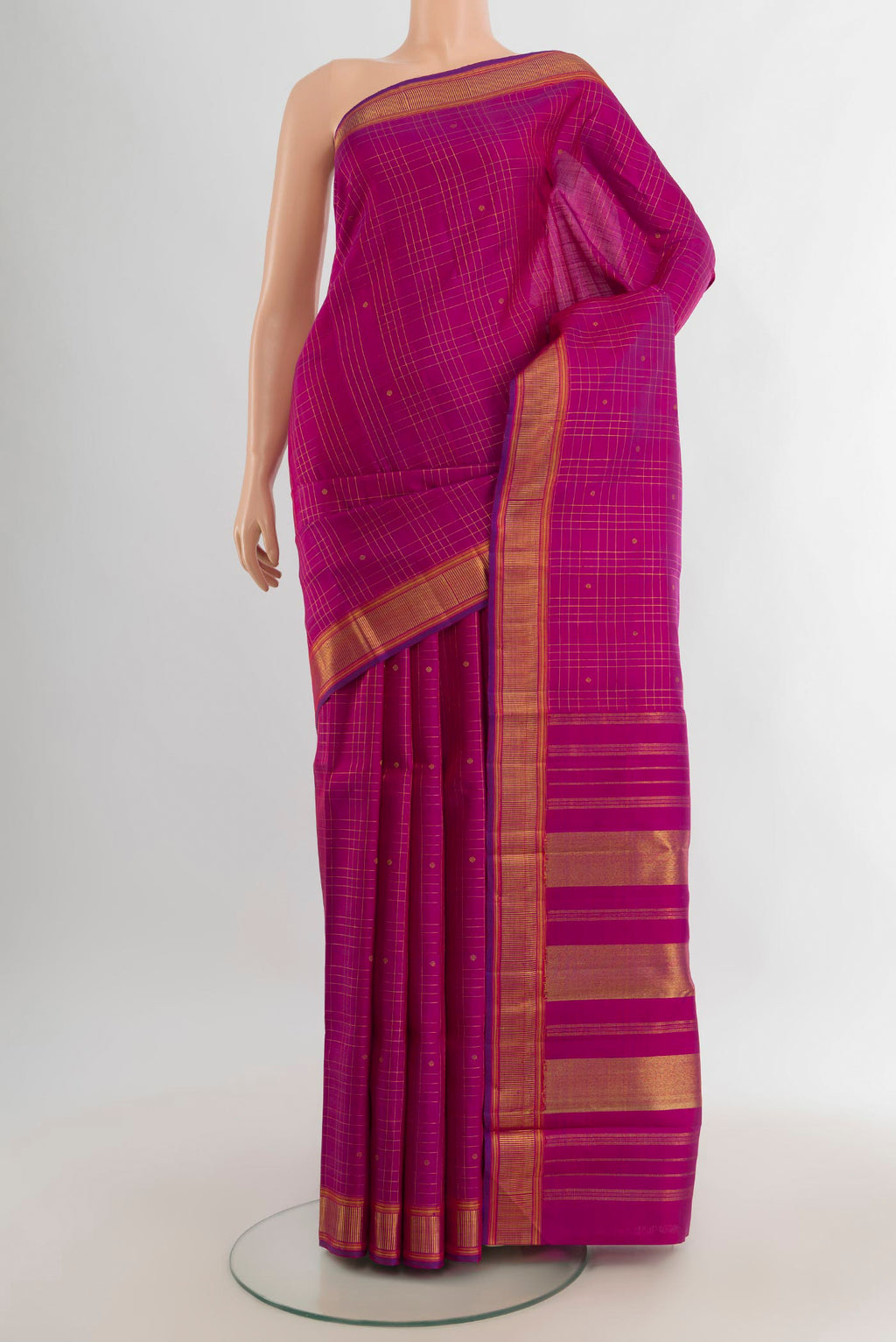 Pure Silk Pure Zari Magenta Kanchipuram Saree with Checked design on the body and Zari Border.  displayed on a mannequin