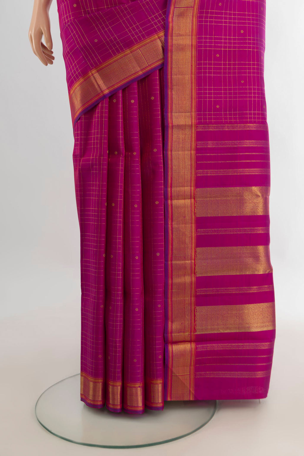 Pleats and pallu of Pure Silk Pure Zari Magenta Kanchipuram Saree with Checked design on the body and Zari Border. 