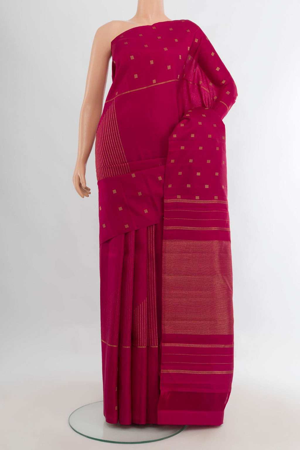 Pure Silk Pure Zari Dark Pink Kanchipuram Saree with Zari Butta on the body and Without Border.  displayed on a mannequin