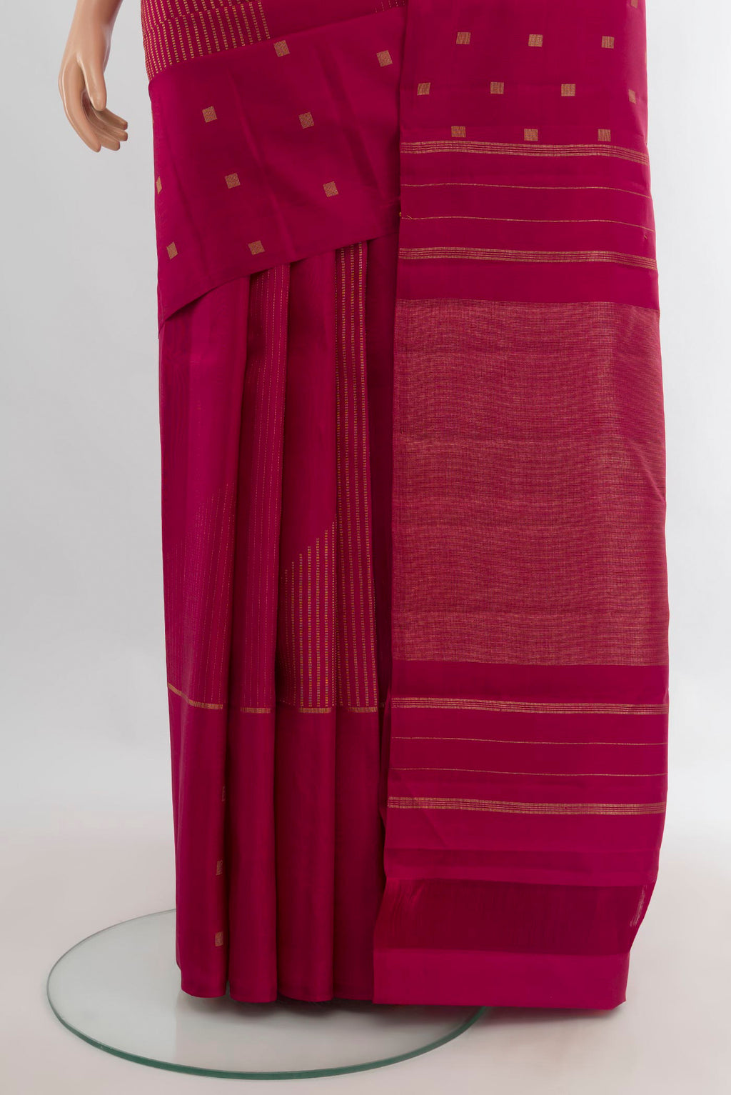 Pleats and pallu of Pure Silk Pure Zari Dark Pink Kanchipuram Saree with Zari Butta on the body and Without Border. 